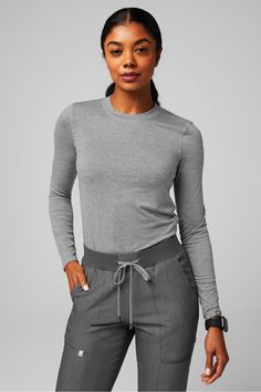 Core Long-Sleeve Underscrub Fabletics Heather Grey female Activewear >> Scrubs >> Tops >> Product Feed Dry-Flex regular 4-Way Stretch/Lightweight/Moisture-Wicking Scrub Undershirts Long Sleeve, Under Scrub Long Sleeve, Scrubs With Long Sleeve Shirt, Scrub Outfits Cute, Female Activewear, Scrub Style, Scrubs Outfit, Feeling Hot, The Office Shirts