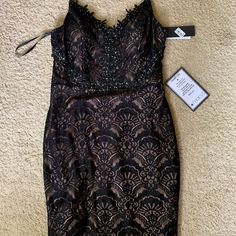 It’s Brand New Never Been Worn Black Lace Midi Dress Perfect For Special Events Or Dances Black Lace Midi Dress For Prom, Fitted Black Midi Dress With Lace Patchwork, Black Sleeveless Lace Midi Dress, Black Lace Knee-length Midi Dress, Black Lace V-neck Midi Dress, Macy Dresses, Black Lace Midi Dress, Lace Midi, Lace Dress Black