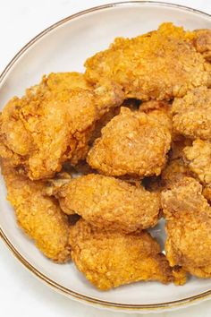 fried chicken pieces on a plate ready to be eaten