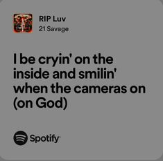 an ad for spotify with the caption i be cryin'on the inside and smiling when the camera is on god