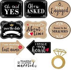 some stickers that are on the side of a white board with gold glitter lettering