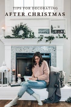 a woman sitting on a couch in front of a fireplace with the words tips for decorating after christmas