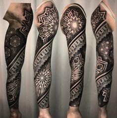 the legs and arms are covered in black ink with geometric designs on them, as well as an intricate design