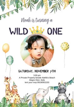 the wild one birthday party is set up with jungle animals, giraffes and balloons