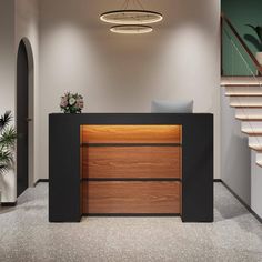 the reception desk is made of wood and black