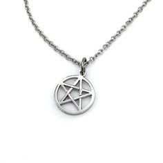 "We're going back in time, back to our roots. For our love of the simplicity and meaning behind the pentacle. The main reason for discontinuing our previous designs was to bring you better quality - and here we have it! Our Stainless Steel Pentacle Collection. Info: Both the 18\" Chain and Pendant on our Pentacle Necklace are made from Stainless Steel. Approx size of pendant: 20mm" Pentacle Jewelry, Pentagram Jewelry, Pentacle Necklace, Pentagram Necklace, Gothic Witch, Chain And Pendant, Wicca Witchcraft, Gothic Clothes, Witch Jewelry