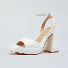 Pennysue chunky block heel provides more stability and comfort compared to a thinner stiletto. The open toe and ankle strap design also make them a contemporary, fashion-forward choice. They could work well for a variety of dressy or formal outfits. Size: 7.  Color: White.  Gender: female.  Age Group: adult. Heel Sandals For Women, White Block Heels, Low Wedge Sandals, Nude High Heels, Heels White, Silver High Heels, White Sandals Heels, Pink High Heels