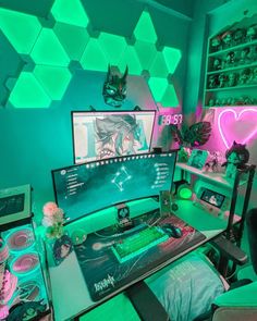 a computer desk with two monitors on top of it in front of a neon green wall