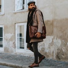 This chunky men's scarf features a variety of textures, including classic cable knit. Crafted with high-quality merino mix yarn and made to last through blustery, cold weather. Black hue goes with any ensemble. Danish designed. Paperboy Cap, Black Leather Messenger Bag, Throwback Songs, Flat Cap Men, Driving Cap, Woolen Cap, Ivy Cap, Grey Slacks, Cable Knit Scarf