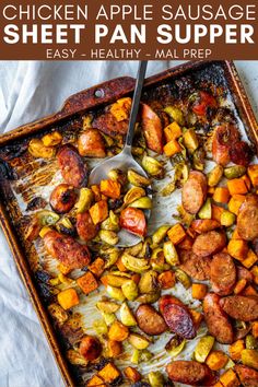 a pan filled with roasted vegetables and a spoon