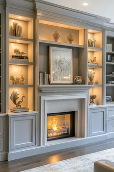 a living room with a fire place and built in bookshelves