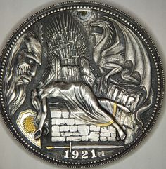 a silver coin with an image of a knight on a horse