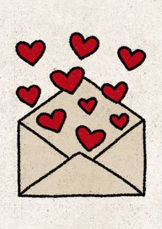 an envelope with hearts coming out of it