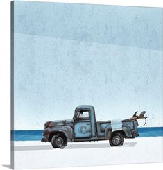 an old pickup truck with a surfboard on the back parked in front of the ocean