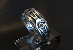 A unique  sci fi/cyberpunk ring , The detailed design is oxidised to create the deep contrast of light & dark areas, this accentuates the details and shows off the intricate design . ---DETAILS--- -Solid Sterling Silver -inspiration: cyberpunk/ sci fi and mechanical design . -ideal gift' wedding ring or engagement ring for those into Alternative' gothic' biker and metalhead fashion ---PRODUCTION--- This sterling silver ring is produced just for you, on a made to order basis. I aim for it to be r Futuristic Wedding Ring, Scifi Jewelry, Cyberpunk Wedding, Futuristic Rings, Ring World Sci Fi, Metalhead Fashion, Sci Fi Jewelry, Mens Gear, Steampunk Design