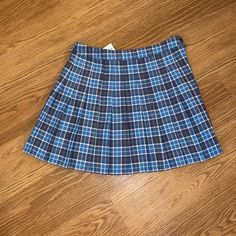 Blue Plaid Skirt Never Worn Nwt Preppy Blue Mini Length Bottoms, Casual Blue Pleated Tennis Skirt, Casual Blue Pleated Skirt, Preppy Blue Cotton Skirt, Summer School Uniform Blue Skort, Blue School Uniform Skort For Summer, Blue School Tennis Skirt, Blue Cotton School Uniform Skirt, Blue Tennis Skirt For School