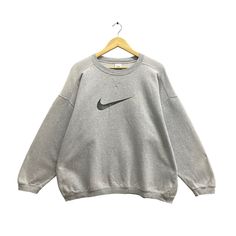 Code : 188 Vintage 90s Nike Swoosh Soft Grey Sweatshirt Medium Nike Center Crewneck Nike Swoosh Sweater Pullover Nike Swoosh Center Print Logo Jumper Size on Tag :  M Details Measurement  Arm Pit to Arm Pit : 28"inches Back Collar to Hem : 27"inches Condition :  Great Vintage Condition(Used Clothing).No Holes And No Stain.Please refer pictures detail.‼️ Pull Nike, Nike Sweatshirts Vintage, Vintage Nike Sweater, Bday List, 90s Nike, Nike Sweater, Nike Sweatshirts, Nike Swoosh, Sweater Pullover