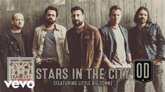 five men standing next to each other with the words stars in the city on them