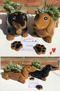 two ceramic dachshund planters with succulents on them, one is