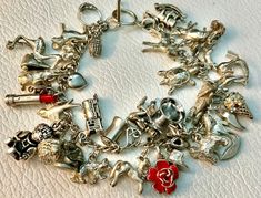 40 Vintage Sterling Silver ANIMALS Charm Bracelet MINIATURES Movers Brown County Basket. Approx: - 7.25” long. I can make it a pinch longer if you need that. In excellent otherwise untested vintage condition. My home is smoke & pet free. Returns are not accepted. I will be happy to combine shipping if it can work out.  International Buyers; Import dues, taxes and charges are the buyers responsibility ! They are not included in the item cost or shipping. Please be aware of your Country's Customs fees before you bid. Vintage Adjustable Charm Bracelet Collectible, Maximalist Rings, Brown County, Vintage Charm Bracelet, Vintage Trends, Silver Charm Bracelet, Long I, Charm Bracelets, Vintage Charms