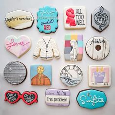 many decorated cookies are arranged on a white surface with the words, i love you and other things