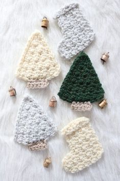 crocheted christmas tree ornaments on white furnishing