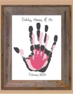 an image of a hand print in a frame with the words daddy, mommy & me on it