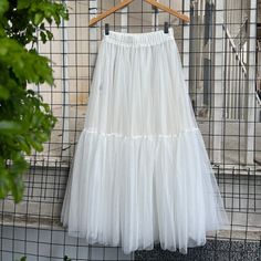 💌This skirt comes with a default length of 85 cm / 33 inches. 👗The lining of this skirt and the main body are separate, featuring both shorts and a skirt as part of the lining set. If you prefer the lining to be sewn into the skirt, please let us know. 💃This skirt comes with two layers of tulle by default, suitable for everyday wear. If you need it for a special occasion, such as a ball or wedding, you can contact us to make it with three layers for a more voluminous effect. ✨The length, colo Summer Full Skirt Petticoat For Costume Party, Spring Costume Skirt With Attached Cancan, Summer Costume Petticoat With Attached Cancan, Summer Skirt With Attached Cancan, Summer Tiered Skirt For Costume Party, Tulle Petticoat Skirt For Costume Party, White Skirt For Spring Costume Party, White Tulle Bottoms For Summer, Costume Party Tulle Petticoat