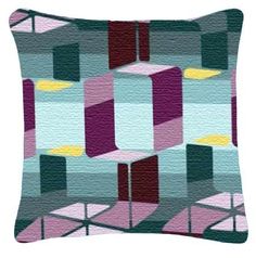 a pillow with an abstract design on it