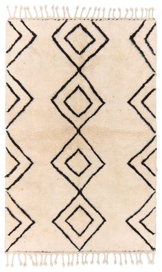 a white rug with black lines on it