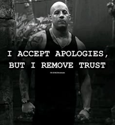 a man standing in front of a brick wall with the words i accept apologies, but i remove trust