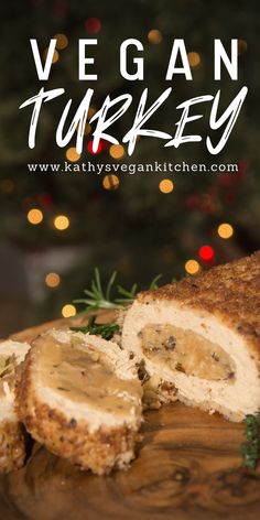 vegan turkey cut in half on a cutting board with christmas tree in the background