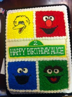 a square cake decorated with sesame street characters and the words happy birthday alice on it