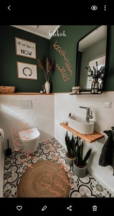 a bathroom with black and white tile flooring