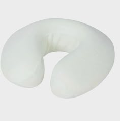 an image of a white neck pillow