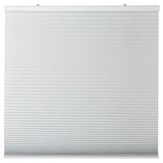 a white roller shade on the side of a window