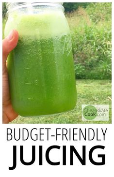 a hand holding a jar filled with green liquid and the words budget - friendly juicing