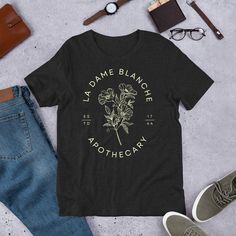 Excited to share the latest addition to my #etsy shop: La Dame Blanche Apothecary OutlanderT-Shirt https://etsy.me/3NpKFrE #outlandergifts #jamiefrasershirt #ladameblanche #sassenach #outlandershirt #clairefrasershirt #outlanderfan Outlander Shirt Ideas, Outlander Svg Free, Outlander Tshirt, Outlander Laoghaire, Outlander T Shirts, Outlander Gifts, Scripture Shirt, Claire Fraser, Jamie Fraser