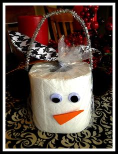 a christmas present made to look like a box with a face on it and the caption reads make a tag that reads'money is scared and times are hard so i'm