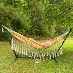 a hammock that is sitting in the grass