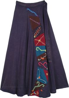 A plus size cool bohemian wrap skirt in stormy skies deep blue, four embroidery panels and patchwork adorn this heavy cotton wrapper.  A dark palette of colors, vibrant, bright, and lively, with each patch each depicting different abstract grasses sewed into the fabric, it bespeaks both fall and harvest. #tlb #WrapAroundSkirt #Patchwork #Embroidered #XLPlus #pluswraparoundskirt #PlusSizeWrap Bohemian Wrap Skirt, Blue Wrap Skirt, Blue Skirt Outfits, Dark Palette, Skirt With Embroidery, Bohemian Wrap, Stormy Skies, Purple Wrap, Navy Blue Skirt