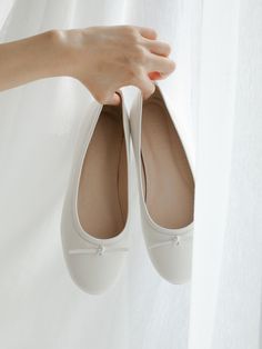 Editor's NotesClassic and easy shoes that you'll never want to take off-  Romantic and vintage flat shoes- 0.2 inch of sponge air insole offers fluffy fit- Round toe- Accented with slim ribbon at the upperMeasurements(in.)- KR 225mm - KR 260mm- Heel height 0.5 in.- Fits true to the sizeComposition & Care- Lambskin- Do not washDesigner- by ABRICO Easy Shoes, White Ballet Flats, Vintage Flats, Ballerina Shoes Flats, White Flats, Men Shoes Size, Flat Shoes, Mens Bottom, Flat Shoes Women