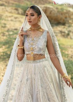 Buy Classy White Choli Bridal Lehenga Pakistani, a royal masterpiece to wear at a wedding. The perfectly stitched Bridal Lehenga Dress is available Online. Bridal Choli, White Bridal Lehenga, Bridal Lehenga Pakistani, Lehenga Pakistani, Lehenga Dress, Resham Work, Stitched Lehenga, Bridal Lehenga Choli, Net Dupatta