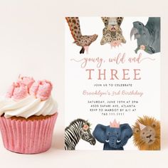 a cupcake next to a card that says young wild and three