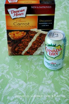 a can of canned food next to a box of cake mix and a can of bread