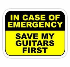 a yellow and black sign with the words in case of emergency save my guitars first