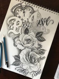 a drawing of roses with the words love and an open heart on it next to two pencils