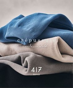 three different colored blankets stacked on top of each other with the words crepus written above them