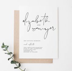 a wedding card with the words elopetta and sony on it next to a plant