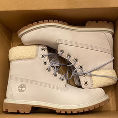 Never Worn, New-In-Box Women’s Timberland Boots In Light Grey Nubuck With Light Blue Laces. Medium Width. Includes A Stylish Faux-Fur Collar. Lush, Down-Free Primaloft Insulation And Seam-Sealed Construction Help Keep Feet Warm And Dry, While Rubber Lug Outsoles Help You Keep Your Footing On Slippery Surfaces. Smoke Free Home. Timberland Knee Boots, Beige Timberland, Timber Boots, White Timberland Boots, White Timberlands, Timberland Boots Women, Timberland Premium, Timberlands Shoes, Timberlands Women